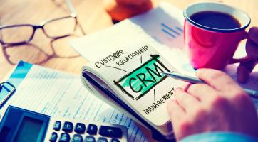 Picture of a person working on a CRM